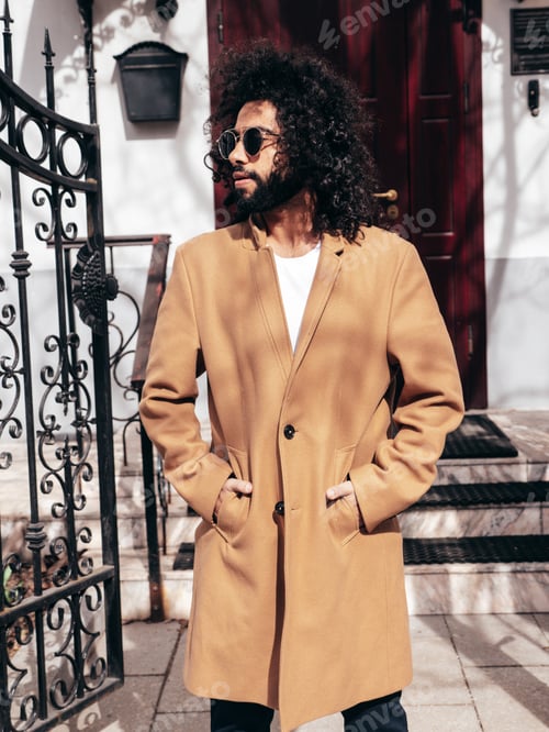 Preview: Handsome man posing outdoors