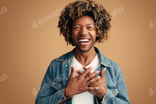 Preview: Sincere black man touching chest