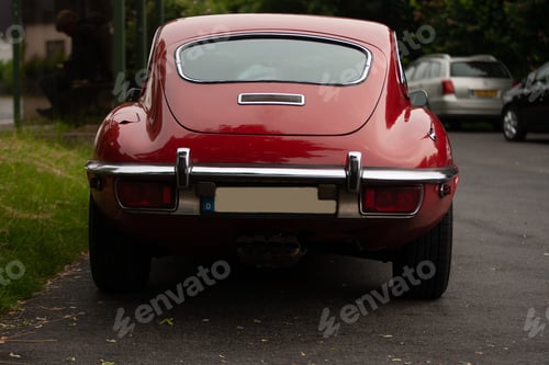 Preview: Red car from behind outdoors