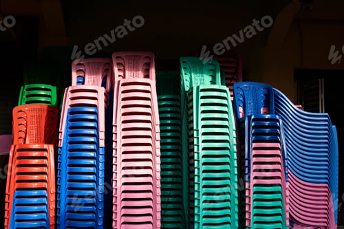 Preview: Stacks of coloured plastic chairs