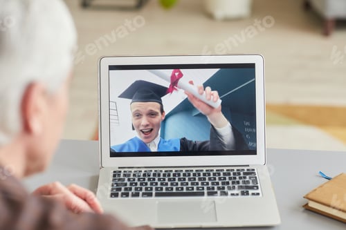 Preview: Online Graduation Celebration with Laptop and Family