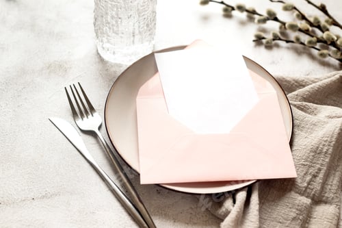 Preview: Blank white greeting card with pink envelope and spring willow branches. Neutral colors.
