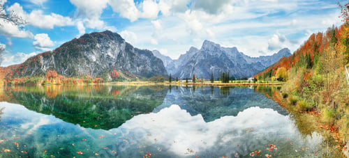 Preview: Fabulous autumn scene of sunny morning on Almsee lake.
