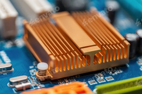 Preview: Computer hardware with a chip, transistor and cooling, close-up. Motherboard