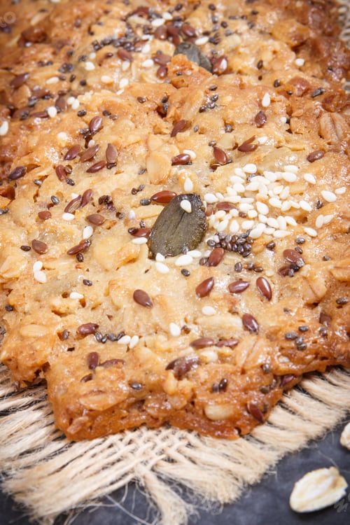 Preview: Fresh baked oatmeal cookies on jute canvas. Delicious crunchy dessert