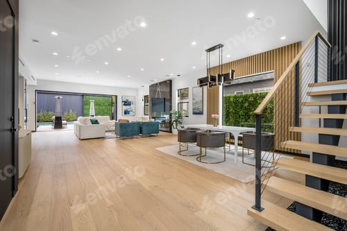 Preview: an open living area is shown with several furniture on the wood floors