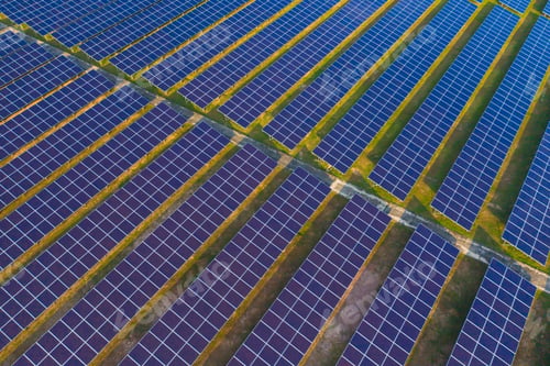 Preview: Aerial view of solar panels or solar cells on the roof in farm. Power plant for electric in industry
