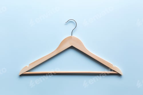 Preview: Wooden Hanger on a Light Blue Background