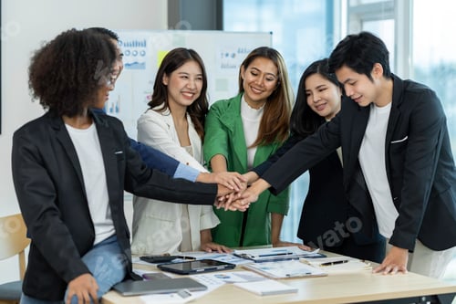 Preview: Group of business people joining hand together for making a deal