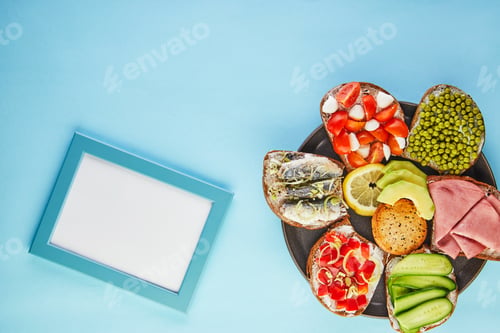 Preview: Assorted open-faced sandwiches, sandwiches with slices of sourdough with various fillings on plate