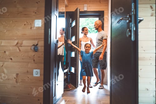 Preview: Young family of three walking inside theri new house for the first time