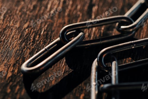 Preview: The chain on an old wood background