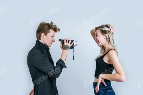 Preview: Happy portrait of Couple holding Video camera and Record clip video