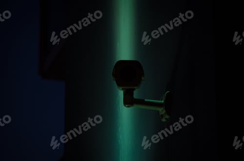 Preview: Security camera peaking from the darkness