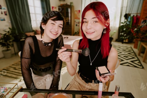 Preview: Smiling Friends Using Makeup Brushes at Home Comfortably