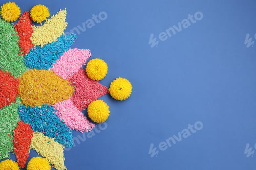 Preview: Diwali celebration. Colorful rangoli on blue background, top view. Space for text