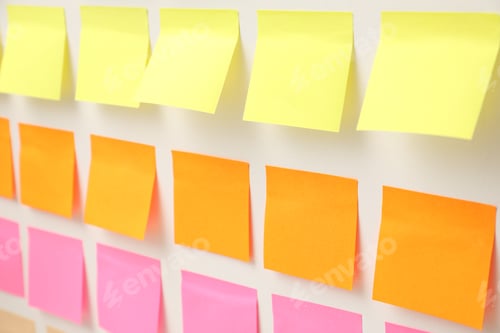 Preview: Blank colorful paper notes on white board, closeup