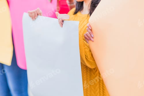 Preview: Protest march or strike holding blank board outdoors. Activist social and feminism rights.