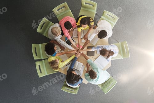 Preview: group of international students with hands on top