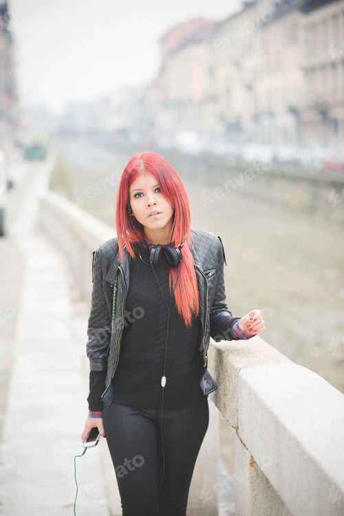 Preview: young beautiful red hair venezuelan woman lifestyle listening music