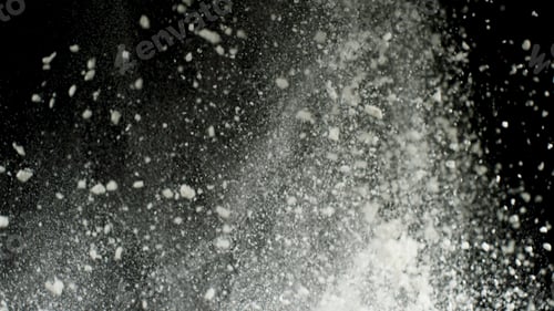 Preview: White dry powder explosion with white dust falling down isolated on black background. Stock footage