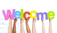 Preview: Colorful Welcome Message with Hands and Letters