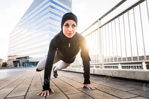Preview: Arabian sportive woman training outdoors