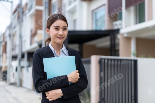 Preview: Portrait of Asian business woman looking at camera. Job application and recruitment concept