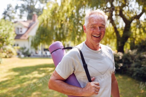 Preview: Portrait Of Senior Man At Home In Garden Wearing Fitness Clothing Ready For Outdoor Yoga Session