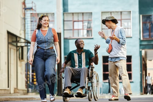 Preview: Multiethnic Group of Friends with Black Man using Wheelchair