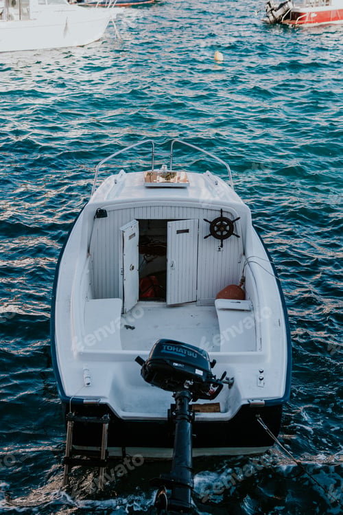 Preview: Boats sailing on the sea near an island in the summer