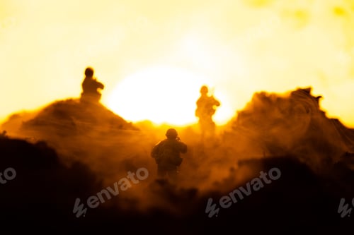 Preview: Selective focus of toy warriors on battleground with sunset at background, battle scene