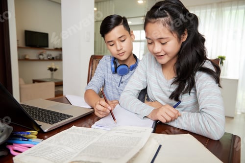 Preview: Boy Helping Girl Friend with Homework