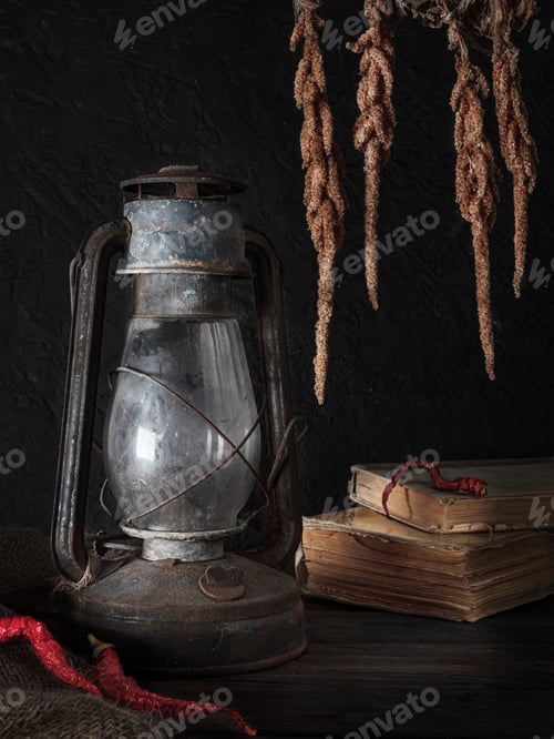 Preview: Old Kerosene Lamp, Books, and Dried Floral Arrangement