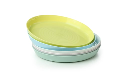 Preview: Colorful plastic plates isolated on white background