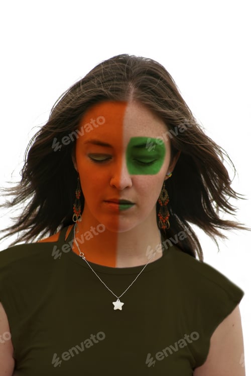 Preview: Beautiful Woman With Her Face Painted In Orange And Green