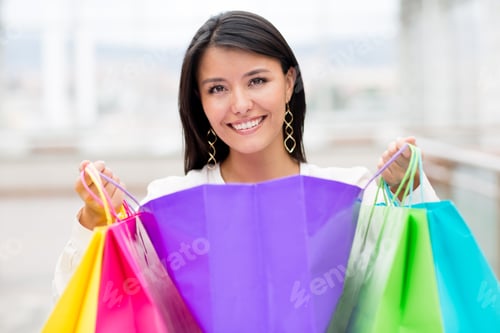 Preview: Happy Shopping Woman With Purchases And Smiling