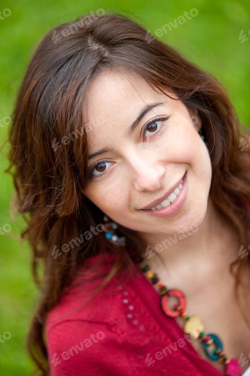 Preview: Portrait Of A Beautiful Girl Smiling Outdoors