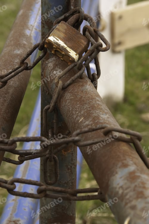 Preview: Padlock On Rusting Chain At Gate To Paddock At Equestrian Center