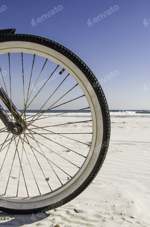 Preview: Front Wheel Of Bicycle On Sandy, Sunny Beach In Florida