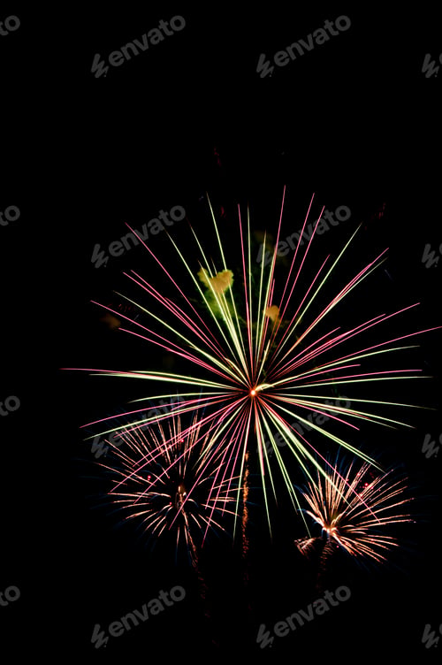 Preview: Two Different Fireworks Bursts With Embers Of Another