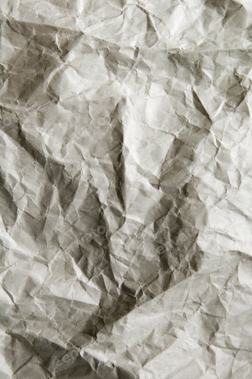 Preview: Hidden Face In Wrinkled Wrapping Paper