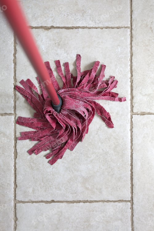 Preview: Red Kitchen Mop Being Used To Clean A Floor Surface