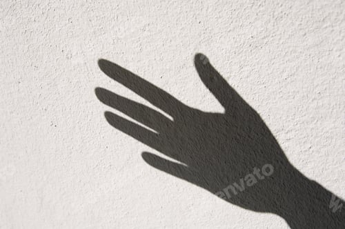 Preview: Shadow Of Human Hand On Whitewashed Wall