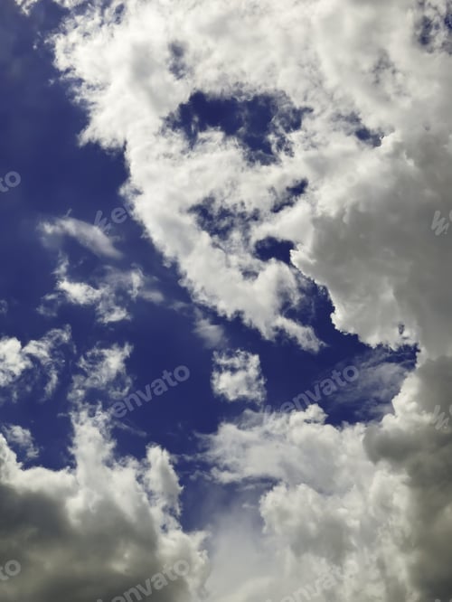 Preview: Approach Of Summer Storm Tearing Up Cumulus Clouds In Blue Sky