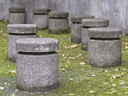Preview: Eight Permanent Individual Seats Of Stone And Concrete On University Campus In Autumn
