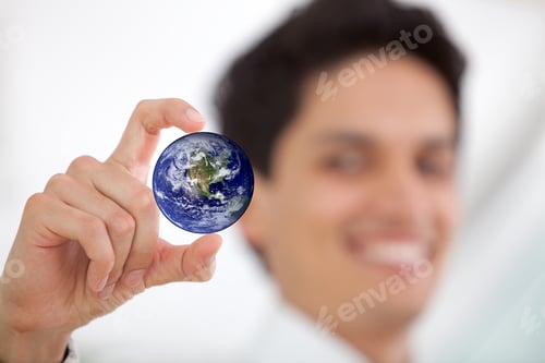 Preview: Successful Business Man Holding The World In His Hand