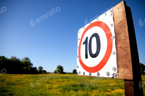 Preview: Speed Sign With A Beautiful Field On The Background