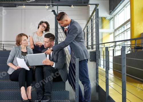 Preview: Team Of Successful Business People Having A Meeting In Executive Sunlit Office