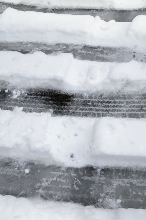 Preview: Winter At A Glance: Tire Tracks In Snow